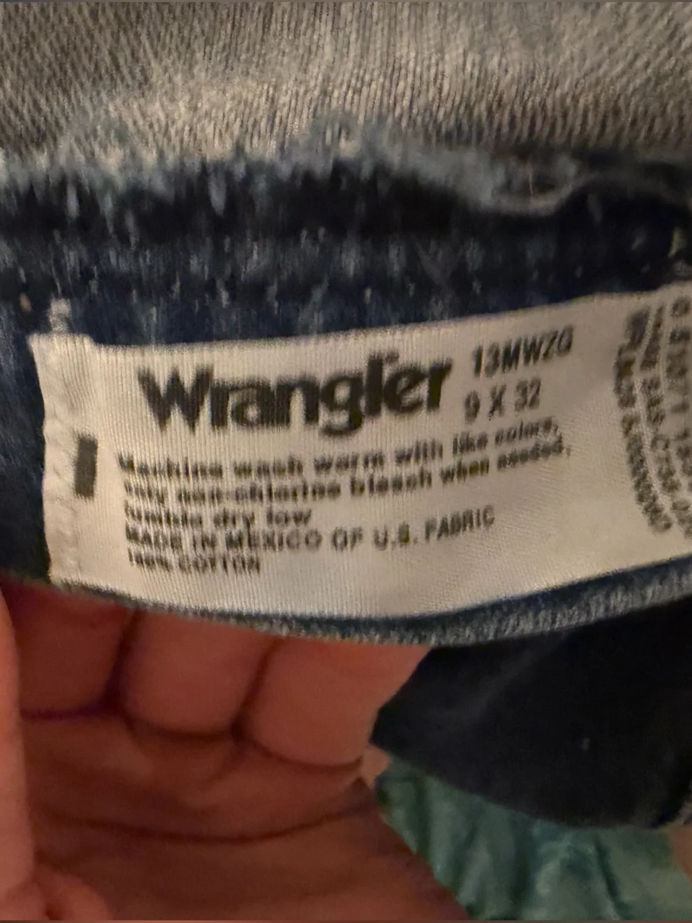 Wrangler Relaxed Fit Denim Jeans in Medium Blue with Orange Stitching